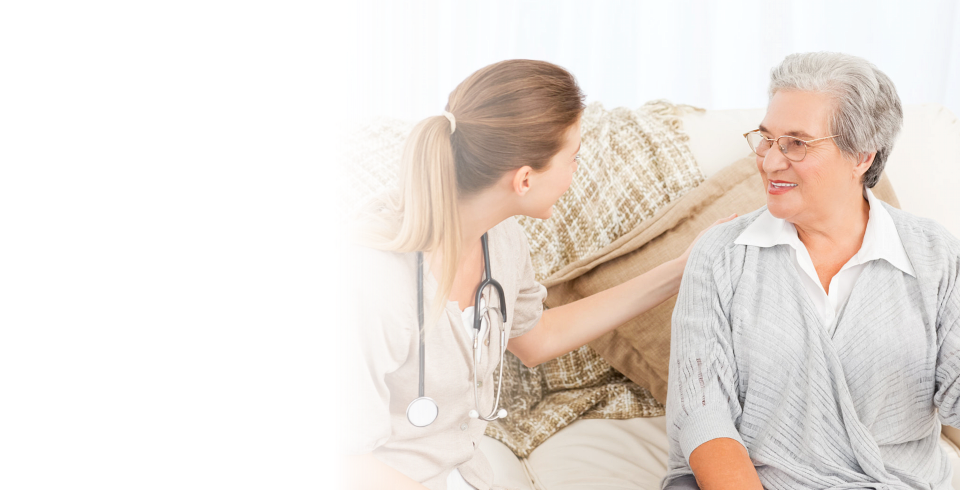 Caregiver talking to her patient